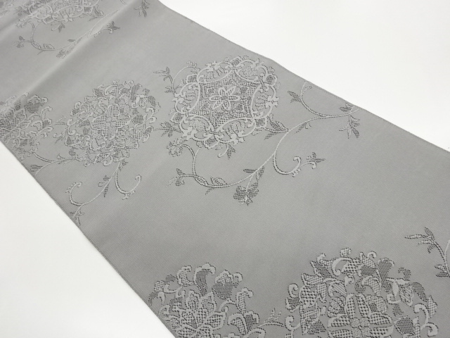 Nagoya obi woven with flower arabesque pattern in a spelled flower pattern